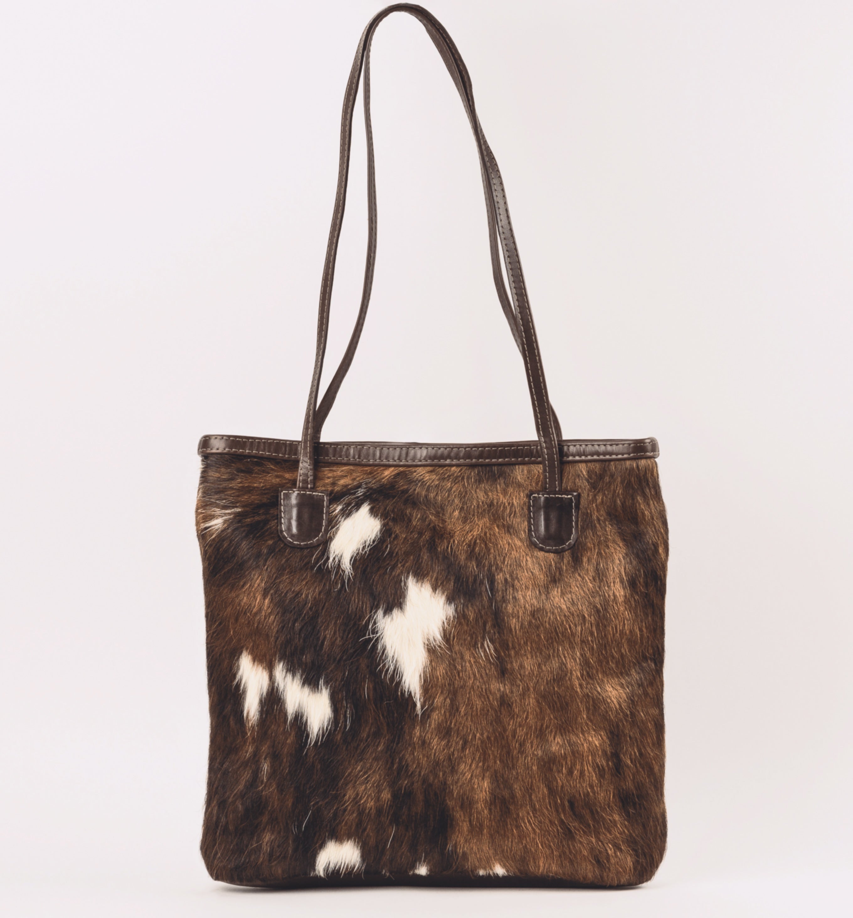 Hair on cow Tri-color and full grain leather back