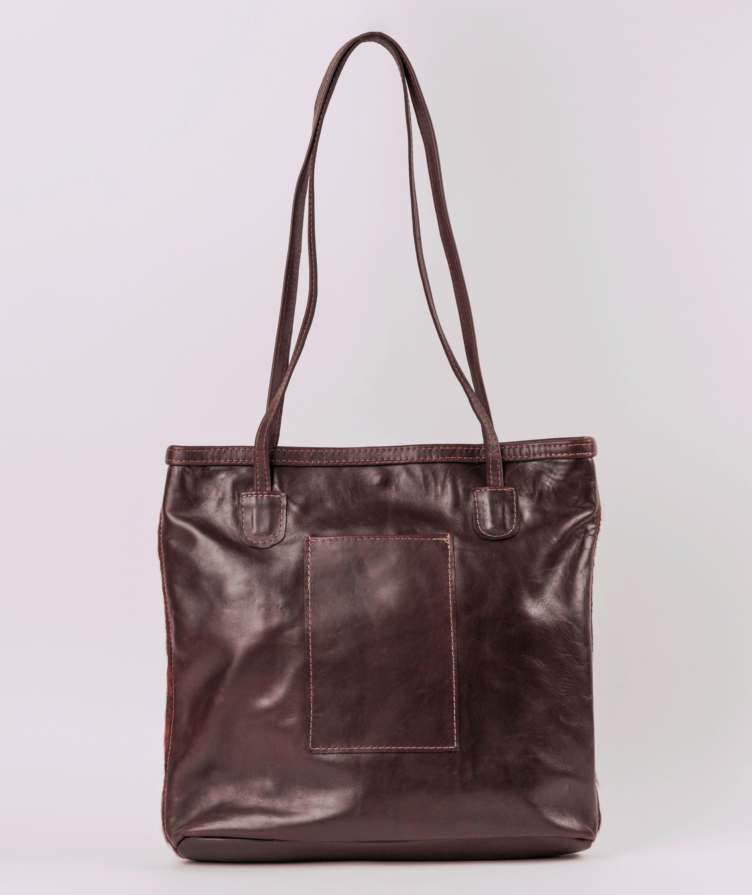 Hair on cow Tri-color and full grain leather back